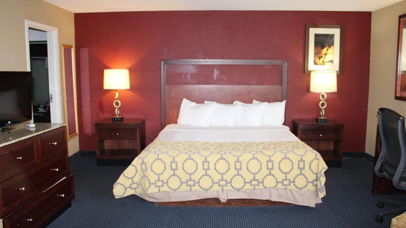 Apm Inn & Suites