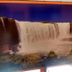 Hotel Flert Santana in Sao Paulo with a large waterfall scene displayed on the wall