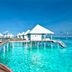 Diamonds Thudufushi Beach & Water Villas overwater villas and turquoise lagoon in Thudufushi