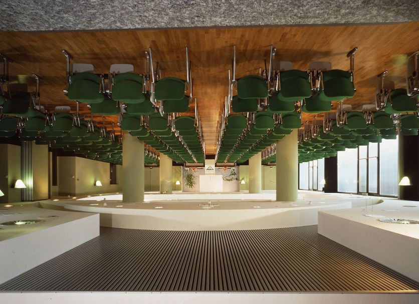 Waldorf Palace Hotel in Cattolica shows an upside-down room with chairs and tables on the ceiling