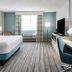 Hilton Garden Inn Jacksonville Ponte Vedra Sawgrass guest room with king bed and ocean view window in Ponte Vedra Beach