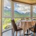 Th Cadore - Hotel Antelao in Borca di Cadore dining room with mountain views through large windows