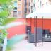 B&B I 10 Mondi Milan patio with white canopy, wicker seating and lounge chairs