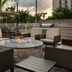 Outdoor fire pit seating area at Residence Inn by Marriott Doral Mall Area in Doral