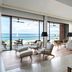 Silversands Grand Anse in St. George's: airy suite with ocean-view terrace and seating area
