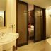 Oasis Tower Shanghai bathroom with vanity and glass doors opening to bedroom