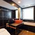 Apa Hotel Nagoya Sakae bathroom with bathtub, orange sink and large window in Nagoya