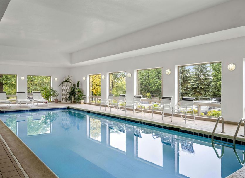 Residence Inn by Marriott Chicago Naperville/Warrenville indoor pool in Warrenville with large windows and lounge chairs