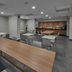 City Express by Marriott Lazaro Cardenas meeting room with tables, chairs, TV and coffee station
