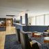 Courtyard by Marriott Kansas City Overland Park/Metcalf lobby seating area with modern chairs and tables