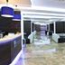 Flamingo Beach Resort Benidorm lobby with modern seating, reception desk and polished marble floors