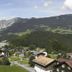 Hotel Montabella in Tschagguns overlooking village rooftops, green hills and alpine mountains
