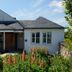 Hillhead Farm Lets in Stirling with a cottage exterior, front lawn, and flowering garden