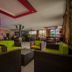Balis Best Bar and Resort Nairobi lounge with colorful seating and bar area