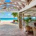 Pineapple Beach Club Antigua Adults Only in Willikies with beachfront view and palm-lined entrance