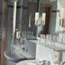Hotel Saltenhof in Hoerstel bathroom with sink, shower, mirror, and wall-mounted lights