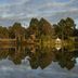 Eight Willows Retreat, Metricup: tranquil lake reflection with trees and cloudy sky
