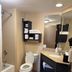 Hampton Inn Harrisburg/Grantville/Hershey bathroom with tub, toilet, vanity, and mirror in Grantville