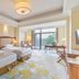 Dongjiao State Guesthouse, Nanjing: twin beds in a bright room with a large window and sitting area