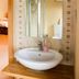 Station Hotel And Restaurant Melrose bathroom sink with mirror and vanity