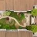 Courtyard by Marriott Lincroft Red Bank courtyard garden with winding path and landscaped seating area