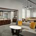 Homewood Suites by Hilton Lynnwood Seattle Everett lobby with seating area and breakfast counter