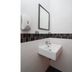 Sindbad Hotel Kuala Lumpur compact bathroom sink with mirror and wall-mounted soap dispenser