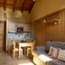 Villa Fridau, Gressoney-Saint-Jean: cozy kitchenette with wooden dining table and sofa seating