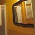 Agriturismo Podere Pratovecchio bathroom with shower stall, towel warmers and wall mirror in Montefollonico
