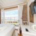 Cunda Piano Otel in Ayvalik guest room with king bed and balcony sea view