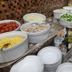 Cypress Hotel Nagoya-Eki Mae breakfast buffet with salad, tomatoes, corn, eggs and shredded chicken in Nagoya