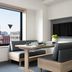 Mimaru Tokyo Asakusa Station dining nook with sofa seating and city view in Tokyo