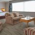 Best Western Heath Court Hotel, Newmarket: spacious guest room with sofa, armchair, coffee table and large window