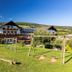 Der Trattner - Hotel Trattnerhof & Hotel Schöcklblick in Fladnitz with playground and hillside views