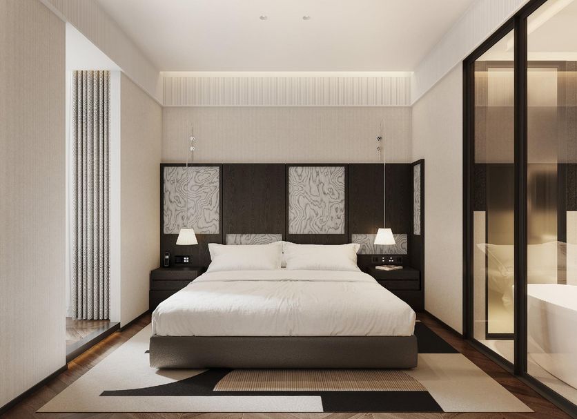 Bo Xuan Hotel (Beijing Yungang Nangong) room with king bed and glass-enclosed bathroom in Beijing