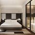 Bo Xuan Hotel (Beijing Yungang Nangong) room with king bed and glass-enclosed bathroom in Beijing