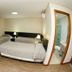 Hotel Financial in Belo Horizonte guest room with two beds and adjoining bathroom