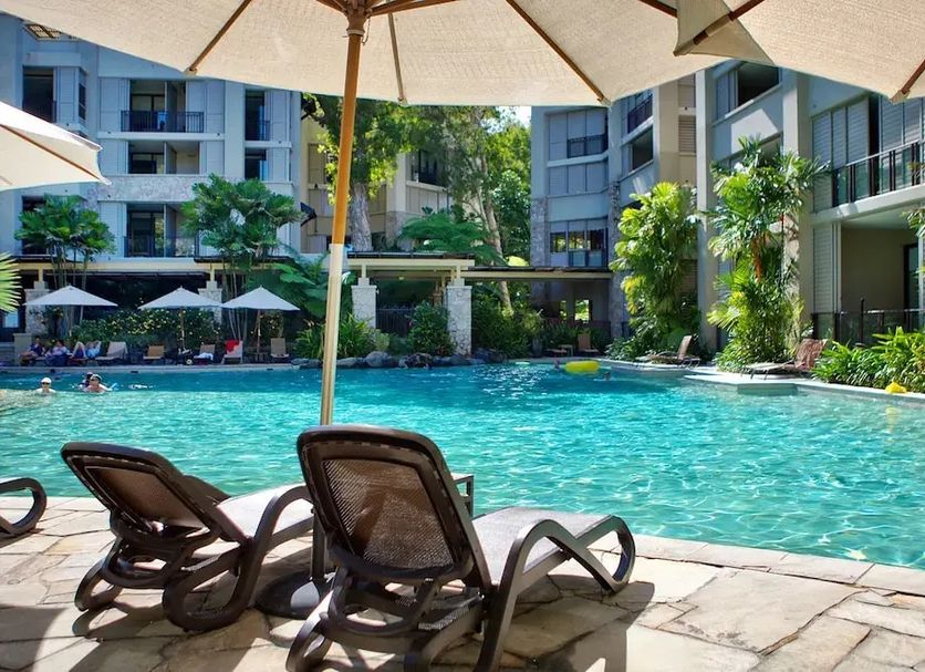 Private Sea Temple Studio King Studio 423 in Palm Cove with resort pool and lounge chairs