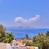 Gardenia Hotel in Kaş with sea view, palm trees, and a terrace overlooking the water