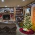 Buffalopeaks Lodge in Buena Vista with cozy lounge, stone fireplace, and decorated Christmas tree