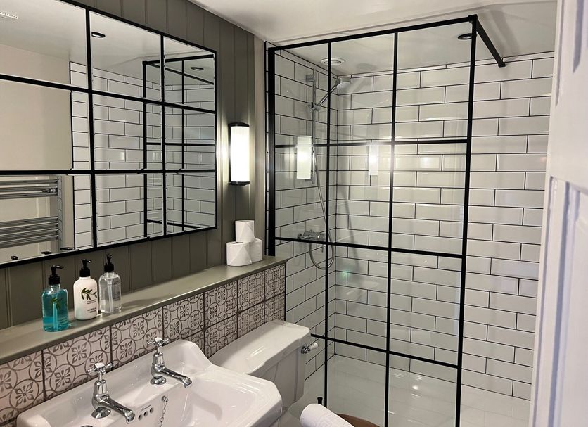 The Punch Bowl, Woodstock bathroom with glass walk-in shower and vanity with double sinks
