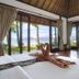 Mali Resort Pattaya Beach Koh lipe room with ocean view, open doors, and towel swan on bed in Ko Lipe