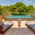 Kaya Palazzo Golf Resort, Belek: private terrace with loungers and a small pool overlooking greenery
