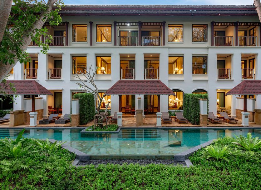JW Marriott Phuket Resort & Spa in Mai Khao with a poolfront courtyard and illuminated balconies