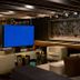 Kimpton Hotel Palomar Beverly Hills lobby lounge in Los Angeles with seating and large blue TV screens