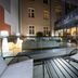 Leonardo Boutique Hotel Krakow Old Town terrace seating with glass railing in Krakow