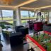 ibis Styles Ouistreham lounge with foosball table and waterfront views in Ouistreham