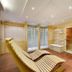 Zlata Hvezda in Třeboň spa area with wooden loungers, tiled floor, and sauna rooms