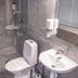 Hotel Aveny Bed & Breakfast in Gävle bathroom with shower, toilet and sink
