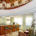 Hotel Riz B.B in San Genesio ed Uniti bar and lounge with stools beneath mezzanine